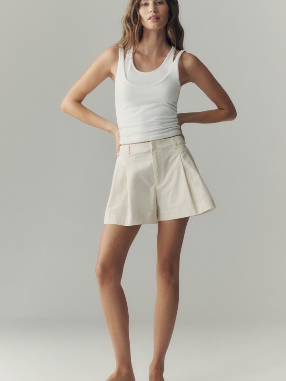 Anthropologie Cream Low-Rise Pleated Shorts